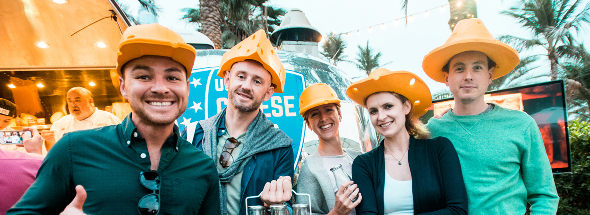 Participants with cheese hats